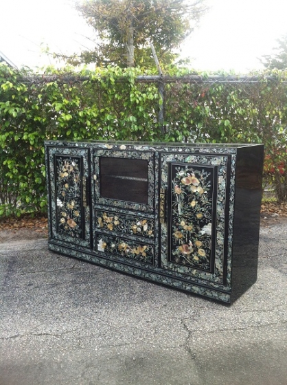 Oriental black dresser repaired and refinished